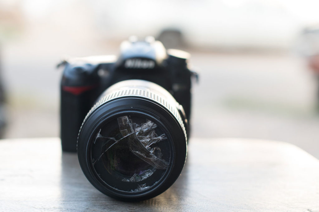 Camera close up with a cracked lens