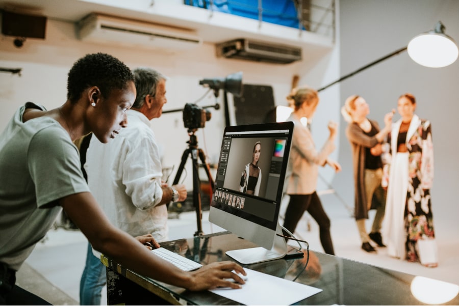 group of photographers working together on set