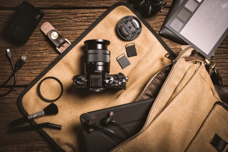 Camera equipment spread out across a table.