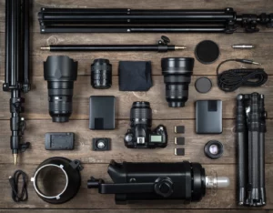 Different photographer tools laid out neatly on a table.