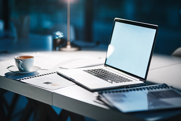 Open computer on a desk