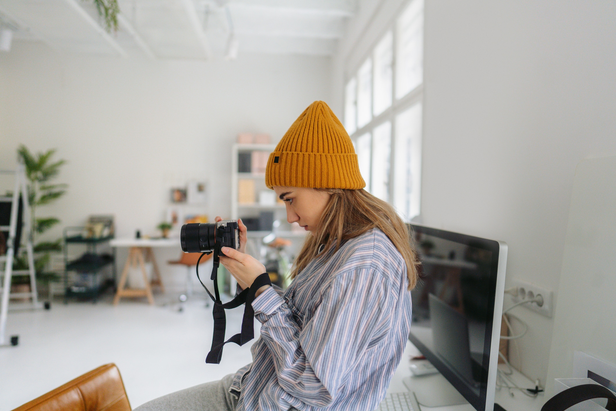 A woman in a photography studio