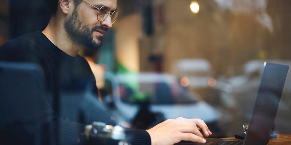 photographer using laptop