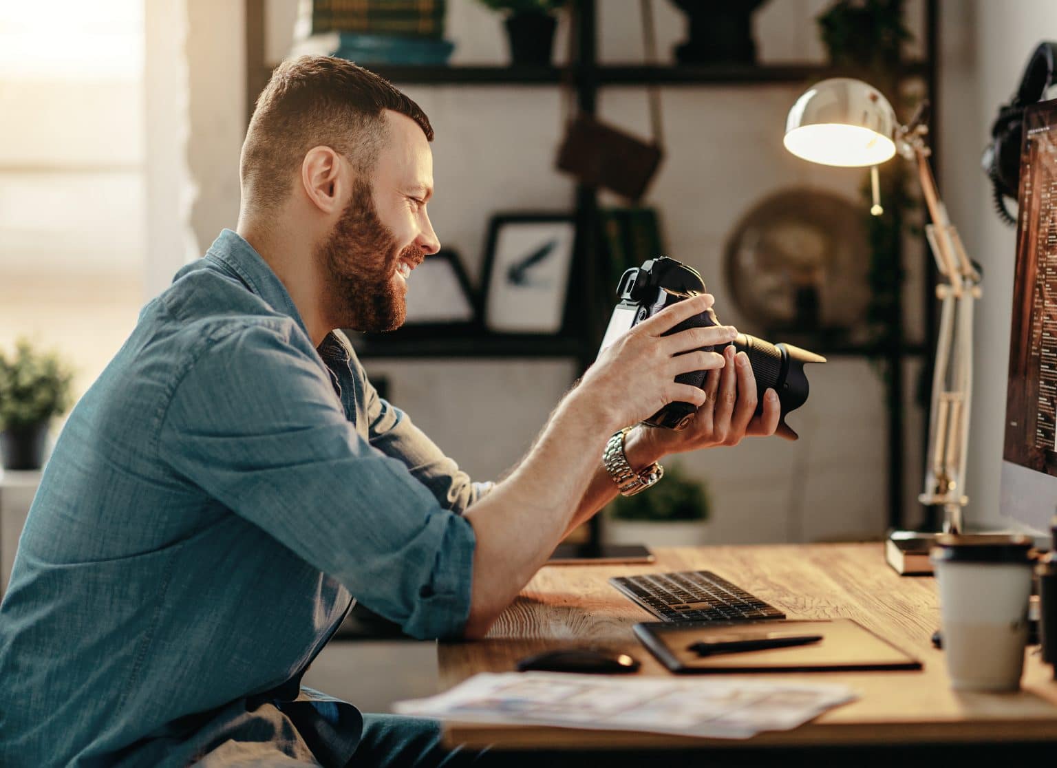 photographer at his desk