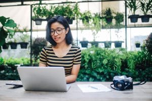 Freelancer woman finishing up with work