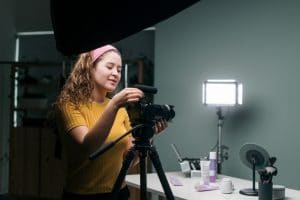 Girl setting up studio to take photos