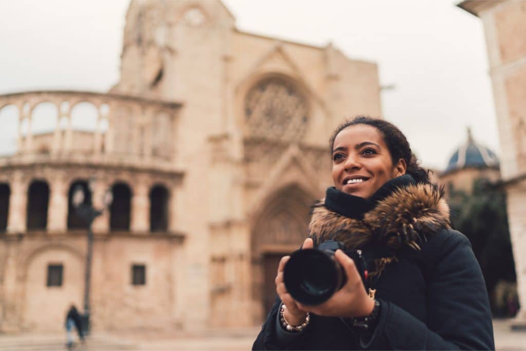 girl traveling with camera