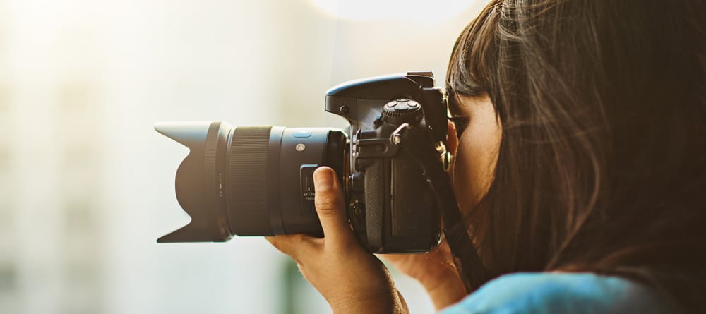 Photographer shooting a cityscape